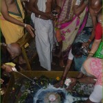 Touch darshan by devotees